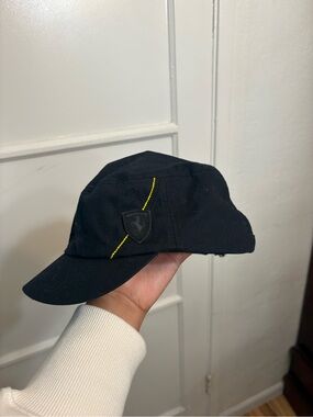 2000s puma  Scuderia Ferrari F1 team cap features a prominent embroidered shield